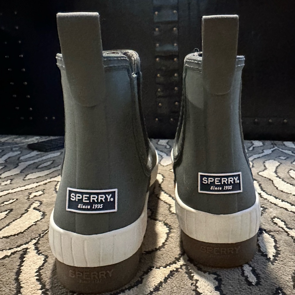 Sperry rain boots.